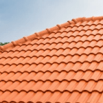 Concrete roof cleaned, remortared and painted